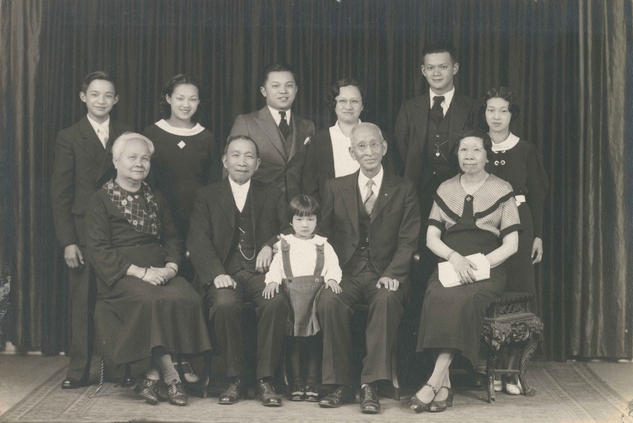 Chan family portrait, [193-?]. Seated (Left to Right) are Mrs. and Rev. Chan Yu Tan, Rev. Chan Sing Kai, and Phoebe Chan.<br><br><i>Lily McCargar fonds, item BCCA 18-39</i>
