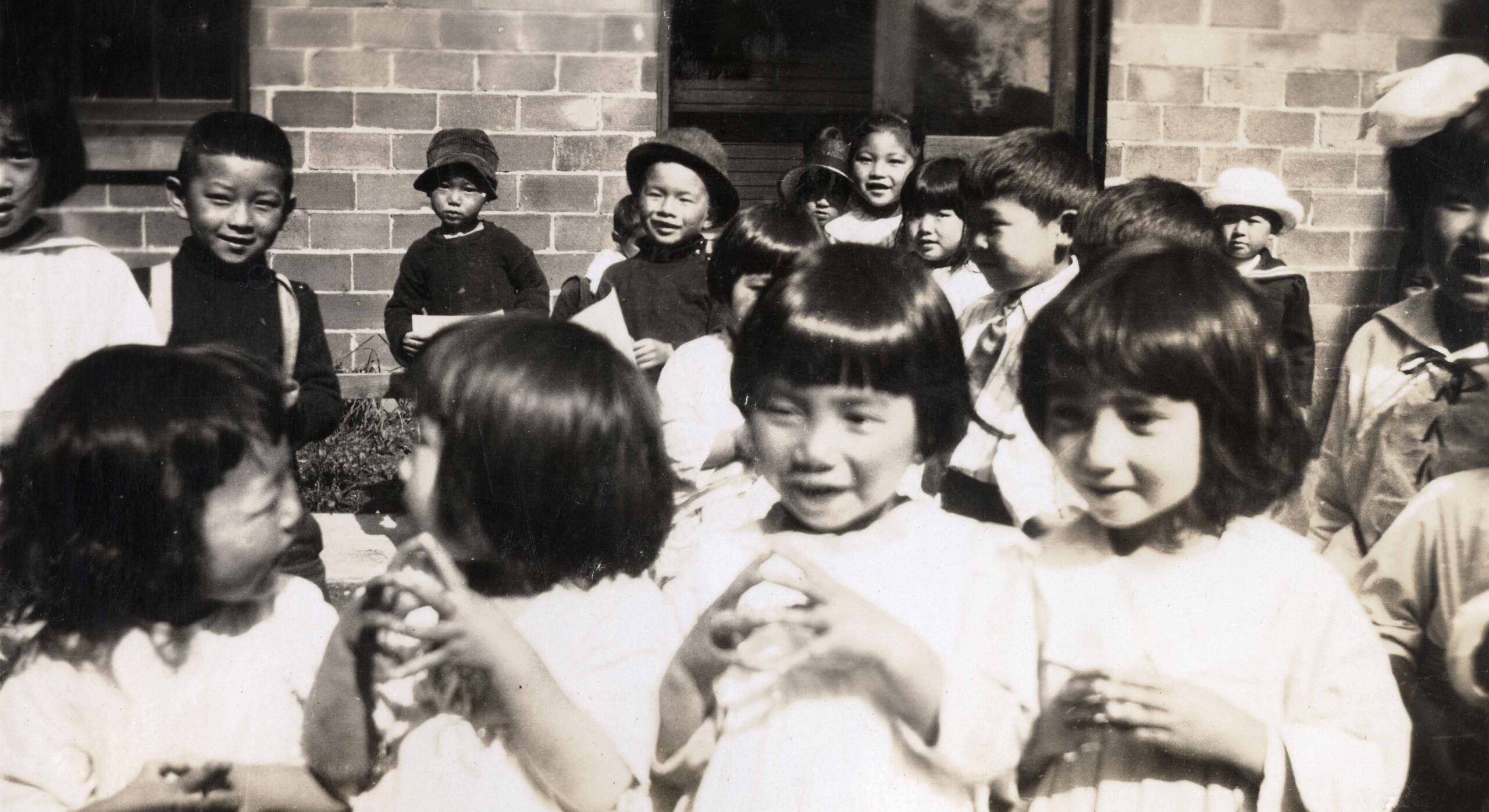 Children playing in front of the Powell Street gymnasium, [ca. 1930].<br><i>Vancouver Japanese United Church fonds, item BCCA 2805.48</i>