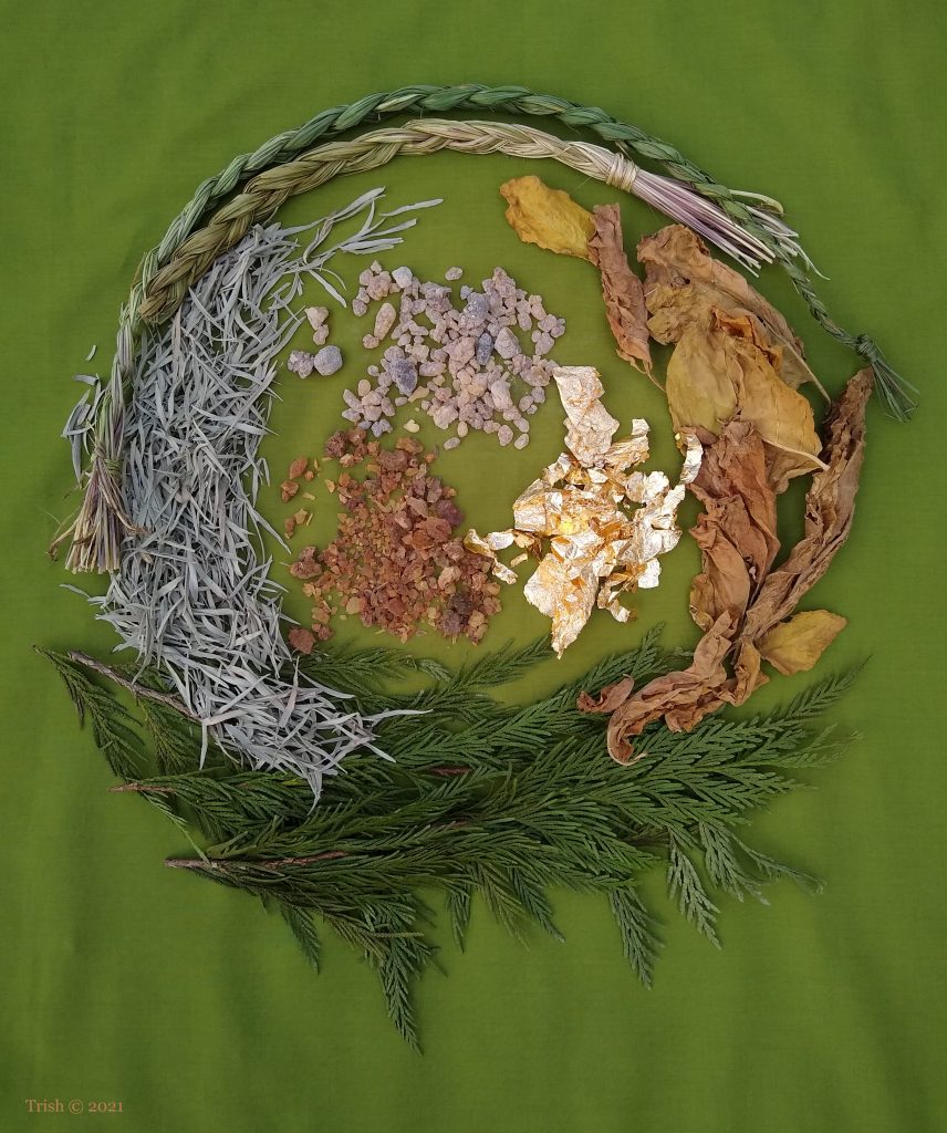 Epiphany – Gifts of the Wise Men and Gifts of the Spirit. Clockwise from right: Tobacco, Cedar, Sage, Sweetgrass, Gold, Myrrh and Frankincense. ©Trish 2021